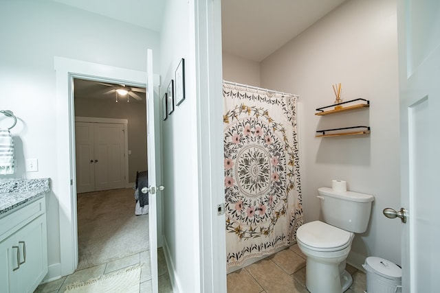 11602 Ga Highway 0085, Waverly Hall, GA 31831 - bathroom featuring vanity, toilet, ceiling fan, tile patterned flooring, and curtained shower
