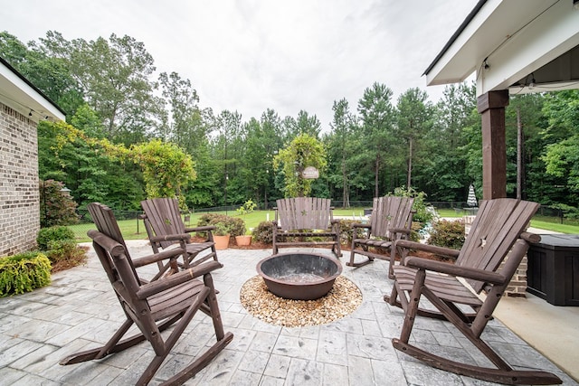11602 Ga Highway 0085, Waverly Hall, GA 31831 - view of patio / terrace featuring view of wooded area and a fire pit