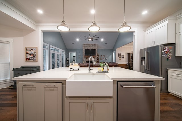 11602 Ga Highway 0085, Waverly Hall, GA 31831 - kitchen featuring a sink, dishwasher, light countertops, open floor plan, and lofted ceiling
