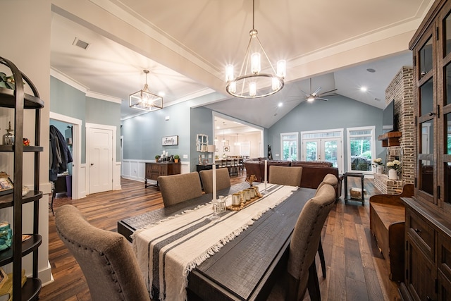11602 Ga Highway 0085, Waverly Hall, GA 31831 - dining room with a chandelier, dark wood finished floors, a ceiling fan, lofted ceiling, and crown molding