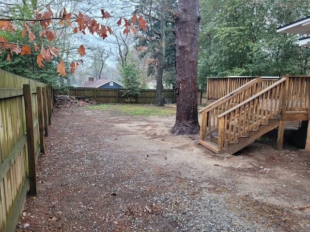 view of yard featuring a deck