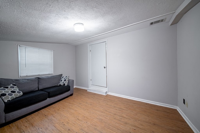 22 Oak Dr, Pine Mountain, GA 31822 - living area featuring a textured ceiling and light wood finished floors