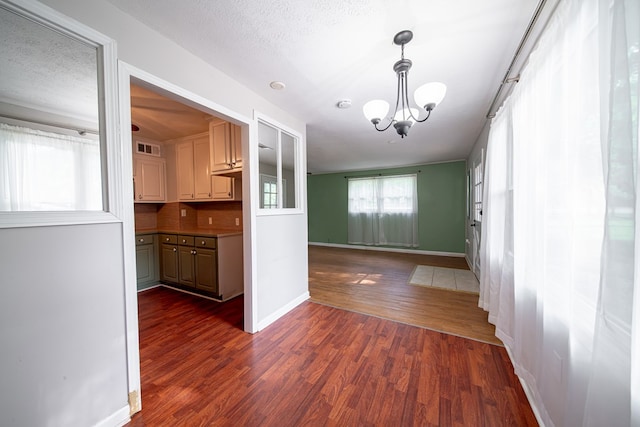 22 Oak Dr, Pine Mountain, GA 31822 - unfurnished dining area with dark wood-style flooring and a chandelier