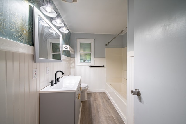 22 Oak Dr, Pine Mountain, GA 31822 - bathroom with wood finished floors, vanity, shower / tub combination, and wainscoting