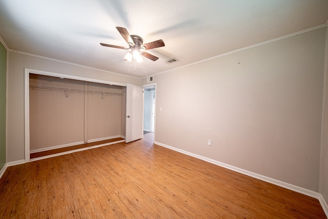 22 Oak Dr, Pine Mountain, GA 31822 - unfurnished bedroom featuring light wood finished floors, a closet, ornamental molding, and ceiling fan