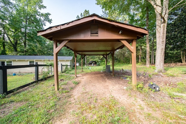 22 Oak Dr, Pine Mountain, GA 31822 - view of yard with dirt driveway and a carport