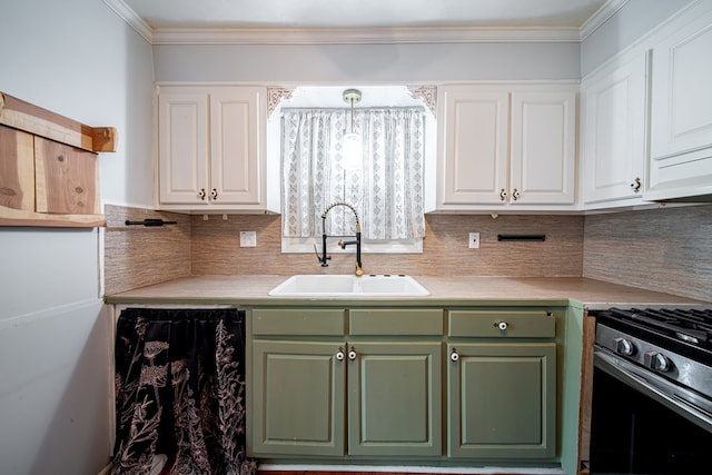 22 Oak Dr, Pine Mountain, GA 31822 - kitchen with green cabinetry, white cabinets, stainless steel gas range oven, light countertops, and decorative backsplash