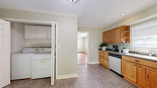3224 Carden Dr, Columbus, GA 31907 - kitchen with stainless steel dishwasher, washing machine and dryer, open shelves, ornamental molding, and dark tile patterned flooring