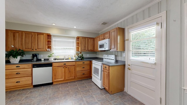 3224 Carden Dr, Columbus, GA 31907 - kitchen with white appliances, open shelves, crown molding, dark countertops, and a textured ceiling