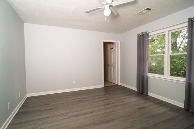 2 Labrador Ct, Columbus, GA 31909 - empty room with dark wood-style flooring and a ceiling fan