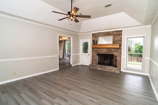 2 Labrador Ct, Columbus, GA 31909 - unfurnished living room with vaulted ceiling, healthy amount of natural light, dark wood-style flooring, ceiling fan, and a textured ceiling
