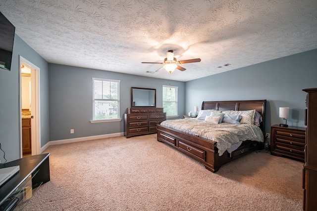 37 Oakwood Dr, Phenix City, AL 36870 - bedroom with a textured ceiling, light colored carpet, and ceiling fan