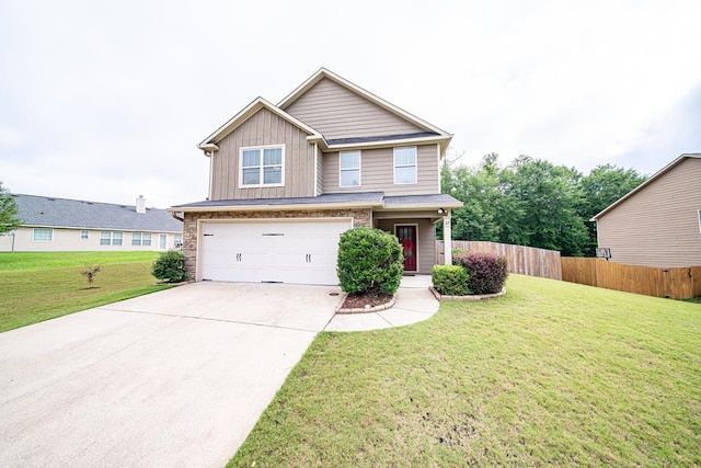 37 Oakwood Dr, Phenix City, AL 36870 - view of front facade with concrete driveway, a garage, and board and batten siding