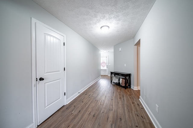 37 Oakwood Dr, Phenix City, AL 36870 - hall with dark wood-style floors and a textured ceiling