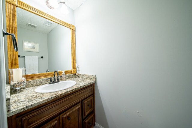 37 Oakwood Dr, Phenix City, AL 36870 - bathroom featuring vanity and baseboards