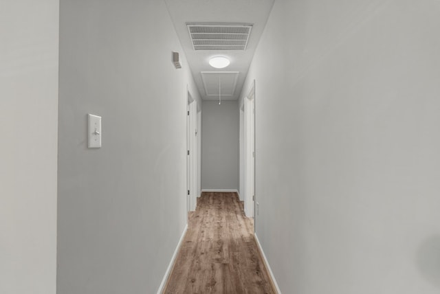 corridor featuring light wood-type flooring