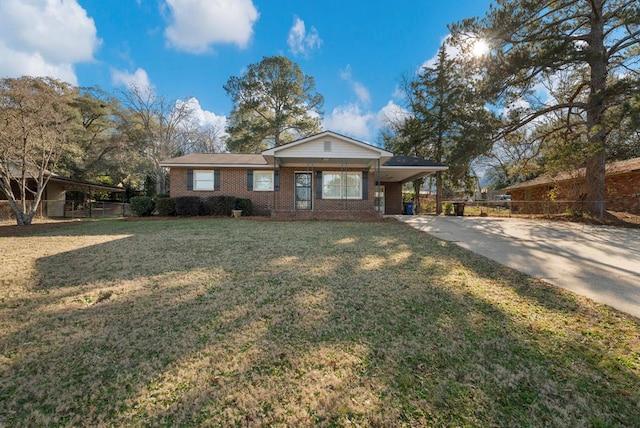 view of front facade featuring a front lawn and a carport