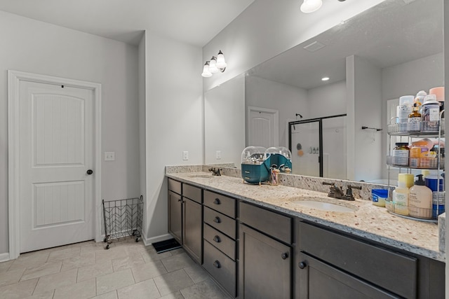 7546 Mockernut Way, Midland, GA 31820 - bathroom featuring double vanity, a stall shower, and baseboards