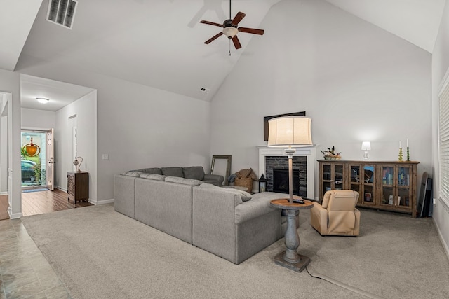 7546 Mockernut Way, Midland, GA 31820 - living room featuring a fireplace, carpet, a ceiling fan, high vaulted ceiling, and baseboards
