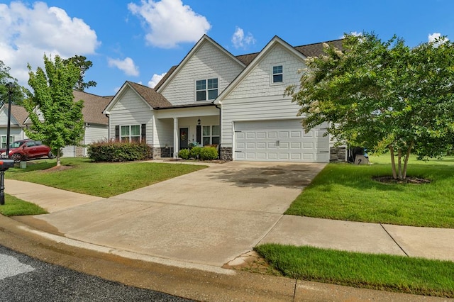 7546 Mockernut Way, Midland, GA 31820 - craftsman-style house with stone siding, driveway, a front yard, and an attached garage