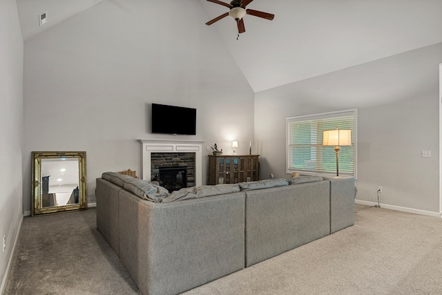 7546 Mockernut Way, Midland, GA 31820 - carpeted living area with high vaulted ceiling, ceiling fan, baseboards, and a fireplace