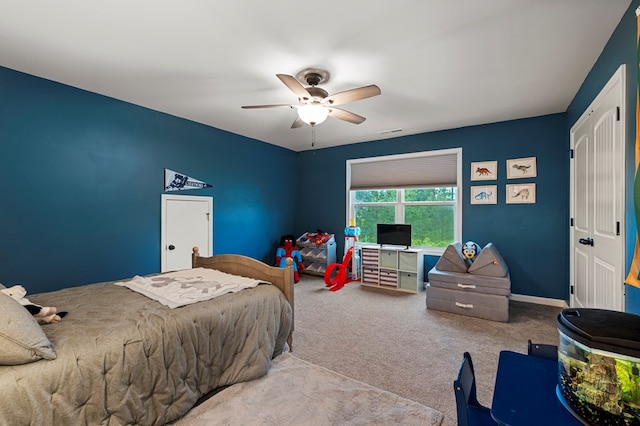 7546 Mockernut Way, Midland, GA 31820 - carpeted bedroom with a ceiling fan and baseboards