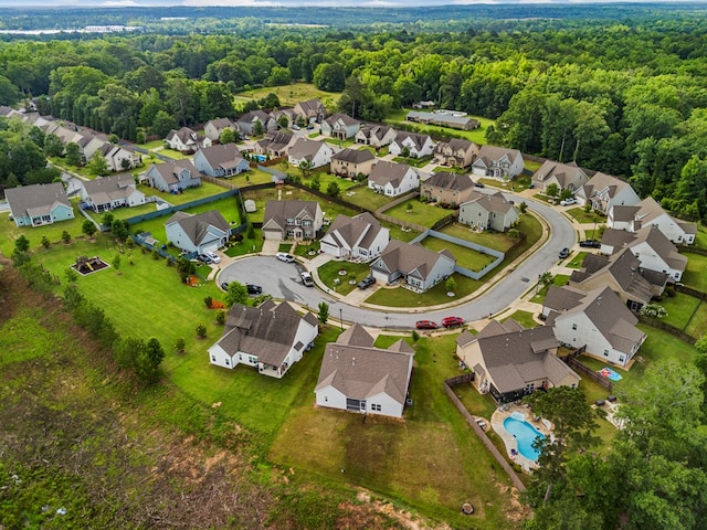 7546 Mockernut Way, Midland, GA 31820 - aerial overview of property's location featuring nearby suburban area, a heavily wooded area, and a pool area