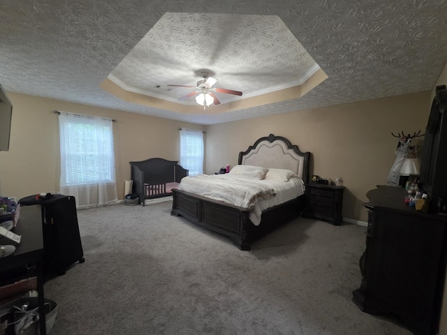 10315 Whisper Glen Ct, Midland, GA 31820 - bedroom with a raised ceiling, carpet flooring, a textured ceiling, baseboards, and a ceiling fan