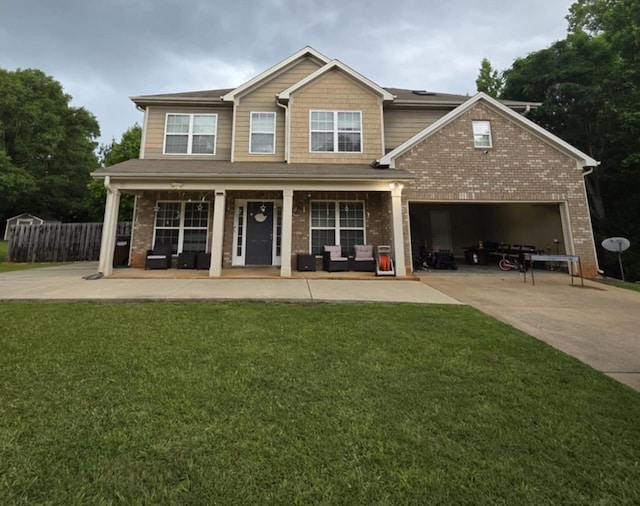 10315 Whisper Glen Ct, Midland, GA 31820 - craftsman-style house featuring driveway, brick siding, a front lawn, a garage, and covered porch