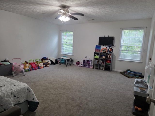 10315 Whisper Glen Ct, Midland, GA 31820 - carpeted bedroom with a textured ceiling and ceiling fan