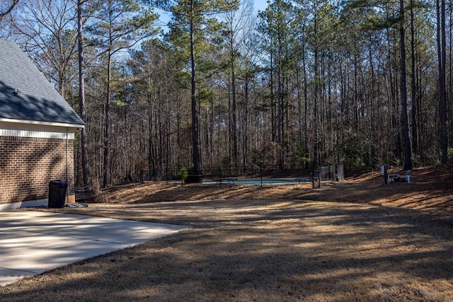 view of road featuring a view of trees