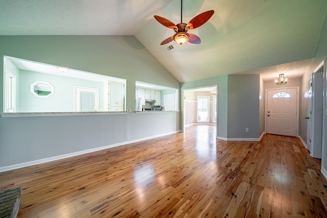 177 Wright Rd, Pine Mountain, GA 31822 - unfurnished living room with a ceiling fan, hardwood / wood-style flooring, and high vaulted ceiling
