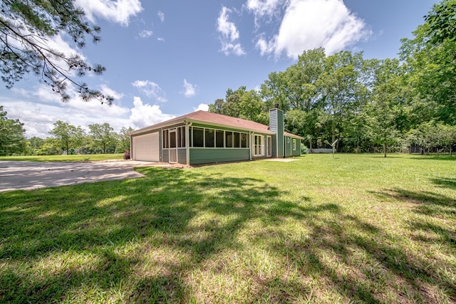 177 Wright Rd, Pine Mountain, GA 31822 - view of grassy yard featuring concrete driveway and a garage