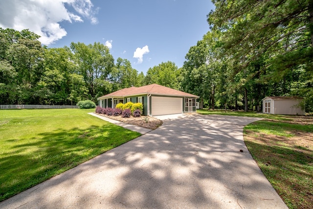 177 Wright Rd, Pine Mountain, GA 31822 - ranch-style house with a garage, a storage unit, and concrete driveway
