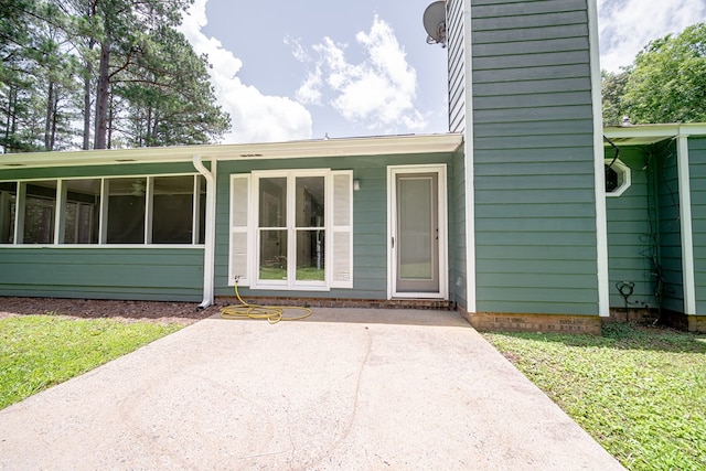 177 Wright Rd, Pine Mountain, GA 31822 - entrance to property featuring a chimney, a patio area, and a lawn