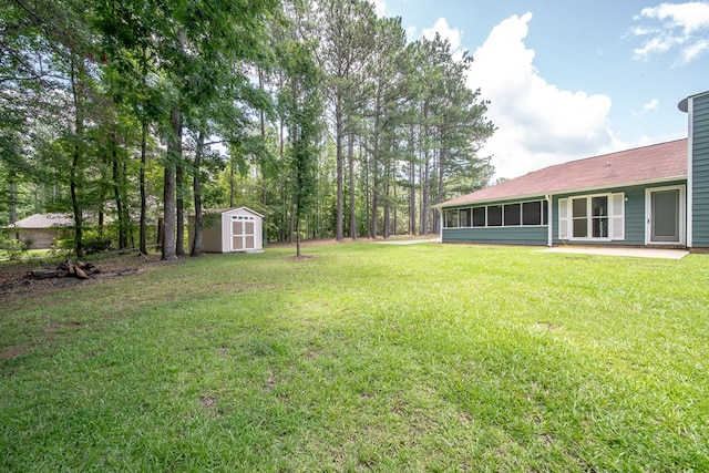 177 Wright Rd, Pine Mountain, GA 31822 - view of grassy yard with a shed and a sunroom