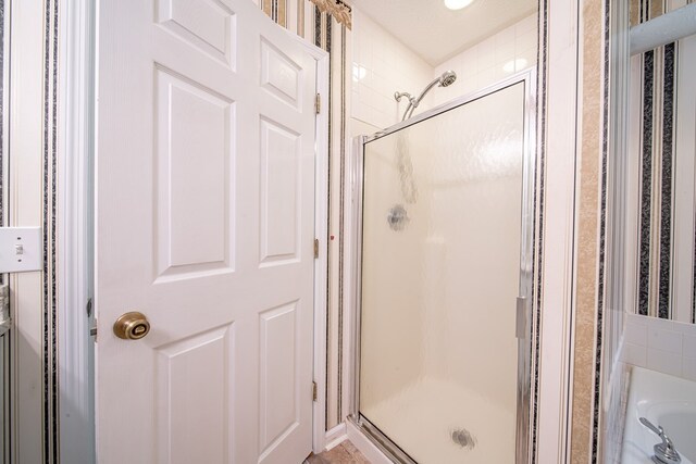 177 Wright Rd, Pine Mountain, GA 31822 - bathroom featuring a stall shower and a garden tub