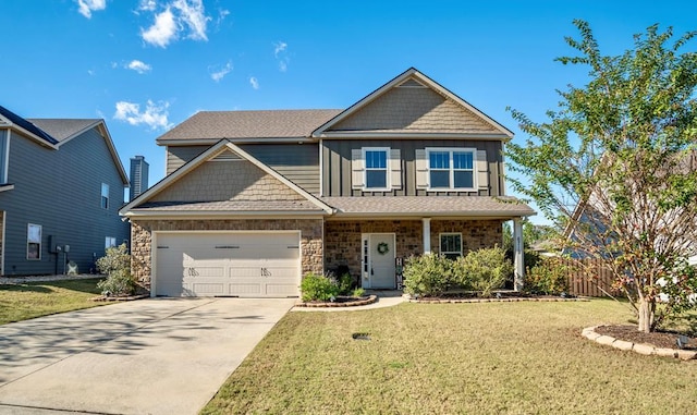 craftsman inspired home with a front lawn