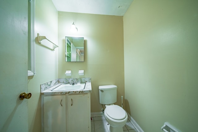 6127 Stony Creek Dr, Columbus, GA 31909 - bathroom with tile patterned floors, toilet, vanity, and baseboards
