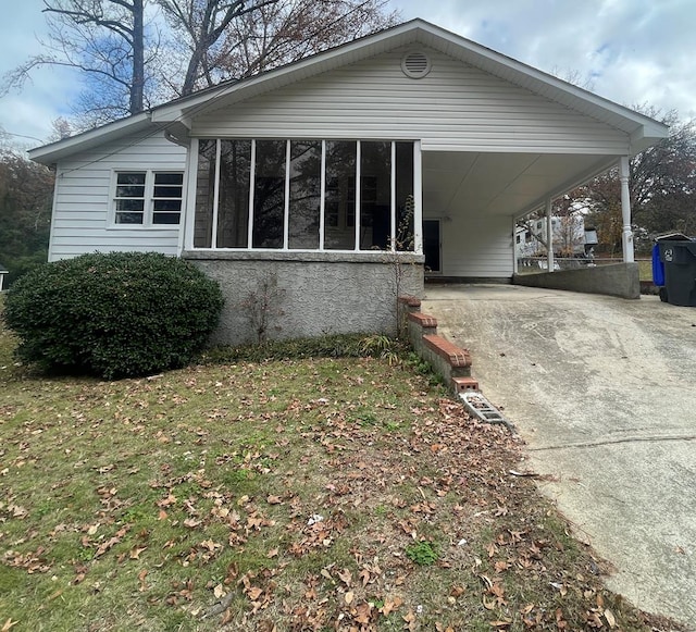 exterior space featuring a carport