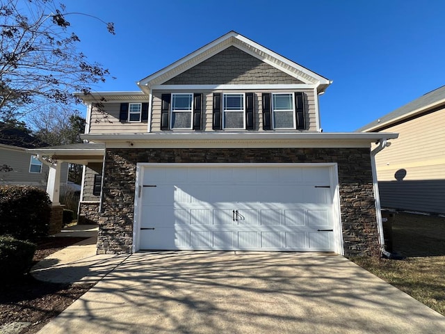 view of front of property featuring a garage