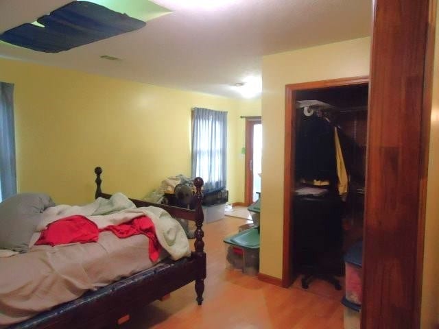 bedroom featuring wood finished floors