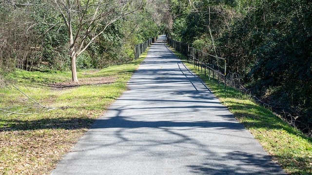 view of street with a forest view