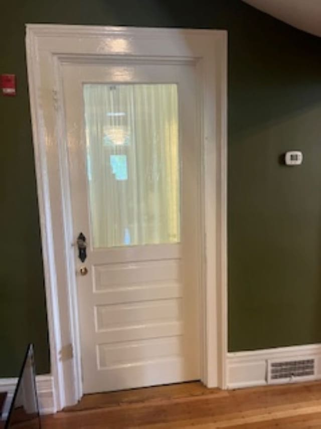 201 7th St, Columbus, GA 31901 - doorway to outside with wood finished floors