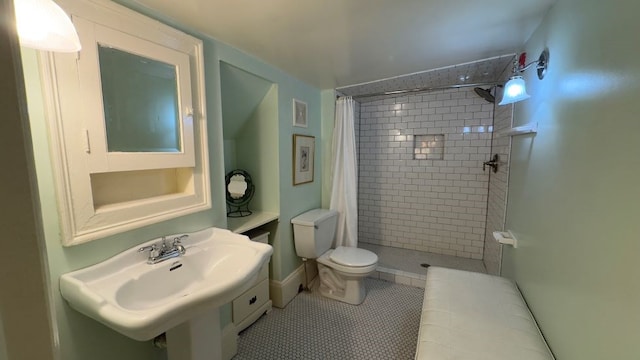 201 7th St, Columbus, GA 31901 - full bathroom featuring a tile shower and tile patterned flooring