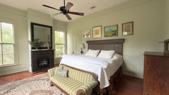 201 7th St, Columbus, GA 31901 - bedroom featuring wood finished floors, a fireplace, and a ceiling fan