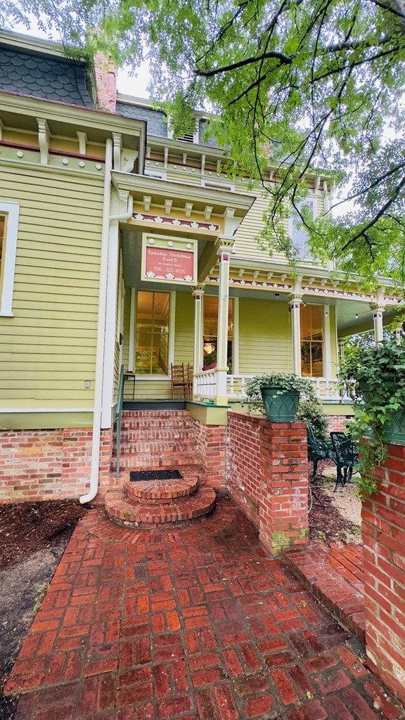 201 7th St, Columbus, GA 31901 - entrance to property featuring mansard roof and covered porch