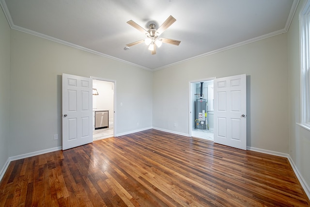 empty room with gas water heater, baseboards, wood-type flooring, and ceiling fan