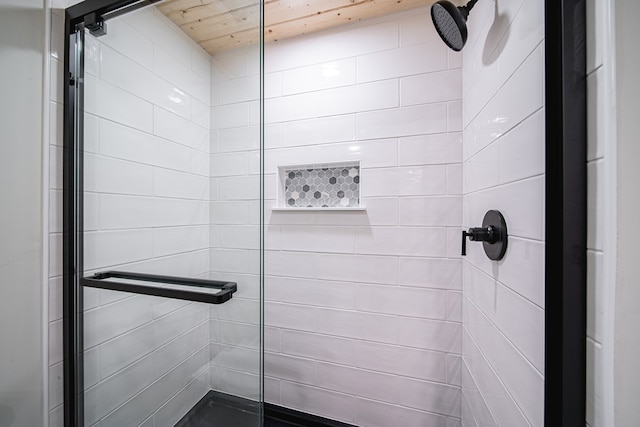 full bath featuring wooden ceiling and a shower stall