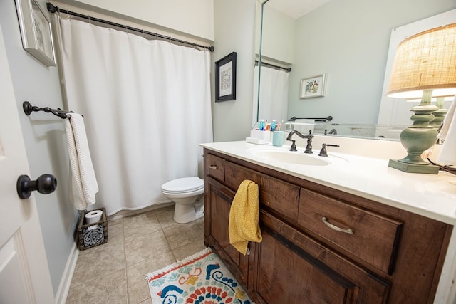 71 Greystone Ct, Smiths Station, AL 36877 - full bathroom with vanity, toilet, tile patterned floors, a shower with shower curtain, and baseboards